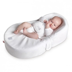 Кокони та матрацики для новонароджених Cocoonababy, DockATot та Träumeland – комфорт з перших днів